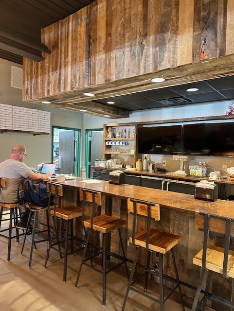 Interior of Timber Pizza Co. at High Park Village, a commercial property managed by York Properties in Raleigh, NC